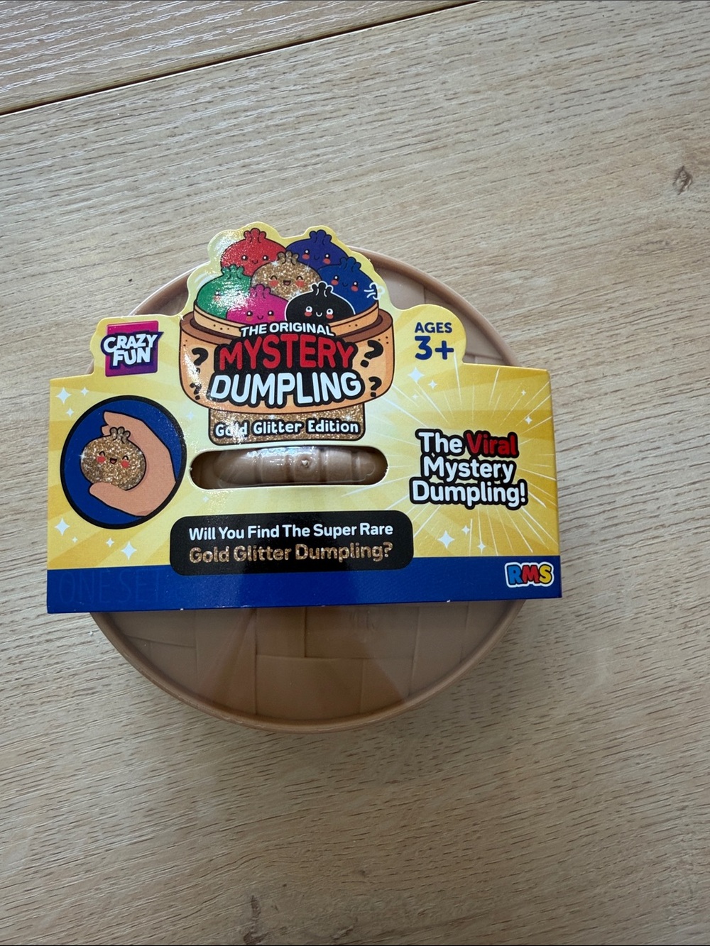 Five below Mystery Dumpling Gold Glitter Edition Toy - UNOPENED NWT
